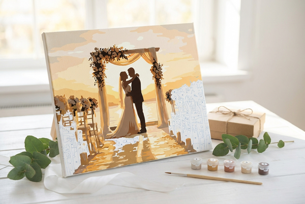 Wedding paint by numbers gift canvas of a couple under a floral arch with ribbon and gift box