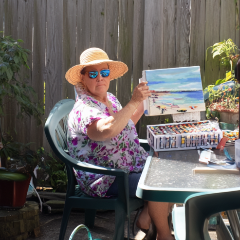 files/amjhed_Outdoor_Table_Reveal_Age_6065_A_60-year-old_woman_is_s_1_ffbf4321-8da0-4836-b0ca-3264bbb6e698.png
