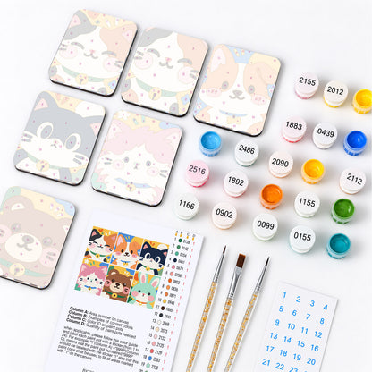 Bell-Collar Kitty Faces fridge magnets – what's in the kit: the 6 magnet tiles, numbered paints, brushes, layout sheet and stickers