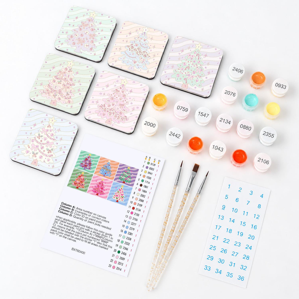 Candy Swirl Christmas Trees fridge magnets – what's in the kit: the 6 magnet tiles, numbered paints, brushes, layout sheet and stickers