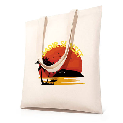Blazing Sun Over the Palms paint by numbers tote bag – Palm silhouettes on a beach under a large red-orange setting sun, Agadir Sunset lettering