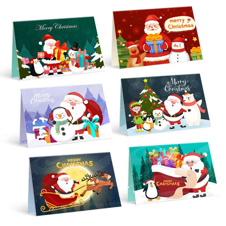 Santa's Moonlit Sleigh and Pals paint by numbers Christmas cards – Santa with penguins, snowmen, a polar bear and elf on green, red, lilac and navy; a sleigh across a gold moon