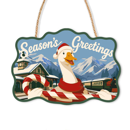 Candy Cane Goose at the Station paint by numbers hanging sign – White goose in a Santa hat and striped scarf with a candy cane at a mountain train station, Season's Greetings, on a wooden sign with a rope hanger