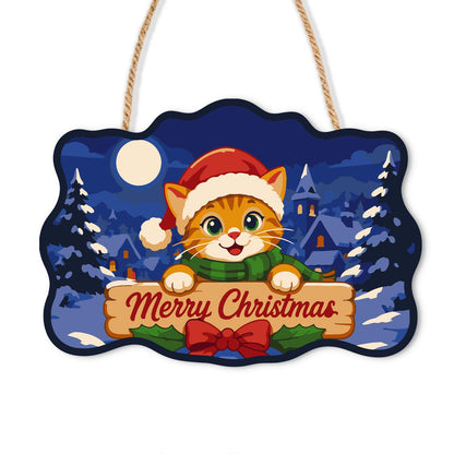 Santa Hat Kitten Moonlit Village paint by numbers hanging sign – Orange tabby kitten in a Santa hat behind a Merry Christmas banner, snowy village under a full moon, on a wooden sign with a rope hanger