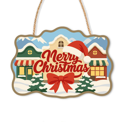 Red Bow Village Storefronts paint by numbers hanging sign – Merry Christmas lettering with a Santa hat and big red bow over snowy village shopfronts, on a wooden sign with a rope hanger