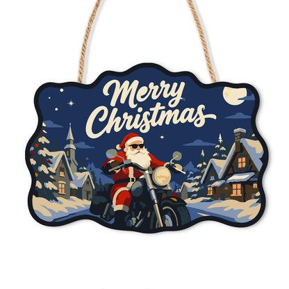 Sunglasses Santa Chopper Ride paint by numbers hanging sign – Santa in sunglasses riding a chopper head-on through a snowy village with a church, Merry Christmas, on a wooden sign with a rope hanger
