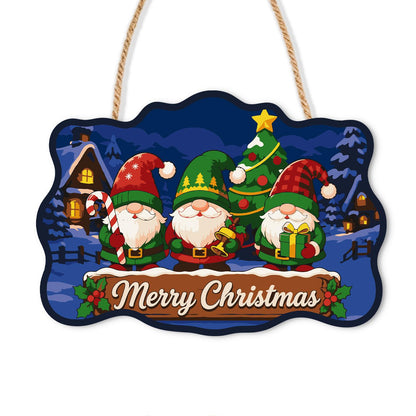 Gnome Trio Under the Starry Fir paint by numbers hanging sign – Three gnomes before a starred tree with a candy cane and gift in a snowy village at night, Merry Christmas, on a wooden sign with a rope hanger
