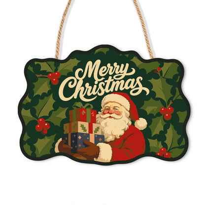 Holly Leaf Santa Gift Stack paint by numbers hanging sign – Santa carrying a stack of wrapped gifts against holly leaves and berries, Merry Christmas lettering, on a wooden sign with a rope hanger