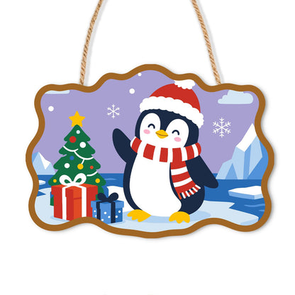 Waving Penguin by the Icebergs paint by numbers hanging sign – Penguin in a Santa hat and striped scarf waving beside a Christmas tree, gifts and icebergs, on a wooden sign with a rope hanger