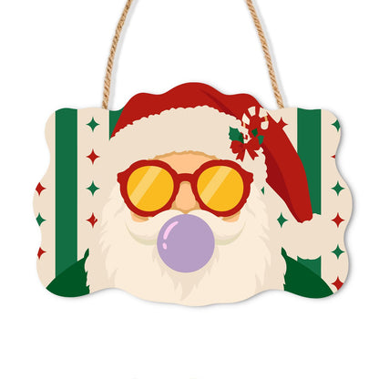 Purple Bubble Santa in Gold Shades paint by numbers hanging sign – Santa's face in round yellow sunglasses blowing a purple bubble gum bubble, with red and green stripes, on a wooden sign with a rope hanger