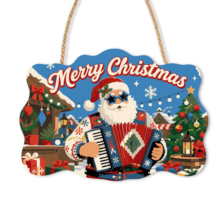 Accordion Santa in Snowy Village paint by numbers hanging sign – Santa in sunglasses playing a red accordion in front of a snowy village and decorated tree, on a wooden sign with a rope hanger
