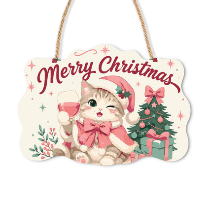 Winking Tabby Pink Wine Toast paint by numbers hanging sign – Winking tabby cat in a pink Santa hat and bow raising a glass of pink wine beside a Christmas tree, on a wooden sign with a rope hanger
