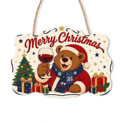 Bear's Red Wine Christmas Toast paint by numbers hanging sign – Brown bear in a Santa hat and navy scarf raising red wine between Christmas trees and gifts, on a wooden sign with a rope hanger