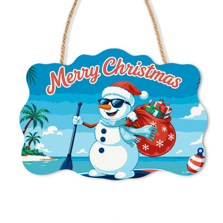 Paddleboard Snowman Delivery paint by numbers hanging sign – Snowman in a Santa hat and sunglasses on a paddleboard holding a paddle and a red sack of gifts, on a wooden sign with a rope hanger