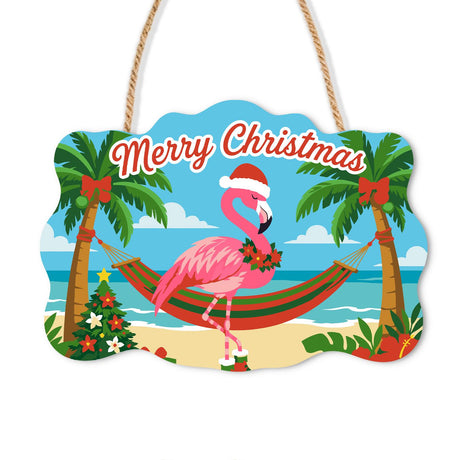 Flamingo's Hammock Christmas paint by numbers hanging sign – Pink flamingo in a Santa hat and wreath collar resting in a striped hammock strung between palm trees, on a wooden sign with a rope hanger