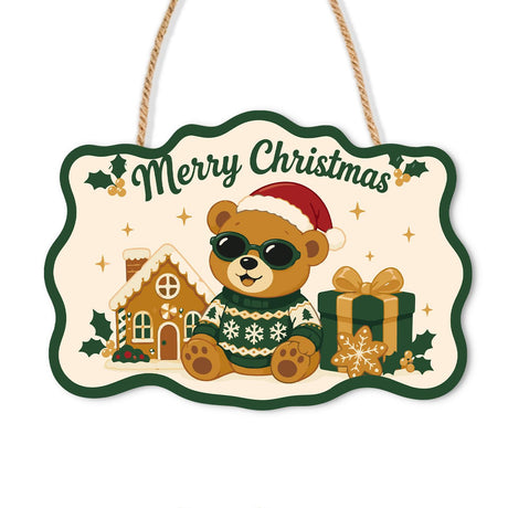 Sunglasses Bear and Gingerbread paint by numbers hanging sign – Brown bear in a Santa hat, sunglasses and green sweater sitting beside a gingerbread house and gift, on a wooden sign with a rope hanger
