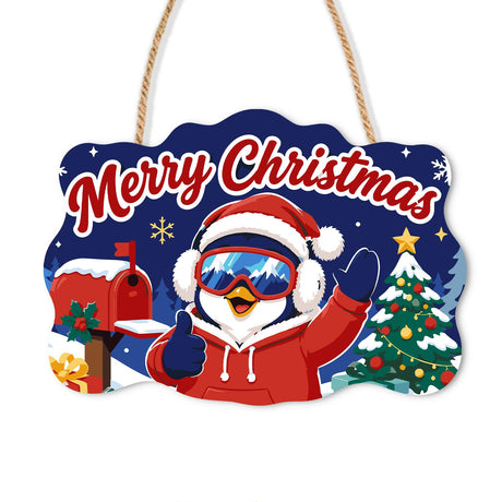 Red Hoodie Penguin's Wave paint by numbers hanging sign – Penguin in a Santa hat, ski goggles and red hoodie waving beside a red mailbox and a snowy Christmas tree, on a wooden sign with a rope hanger