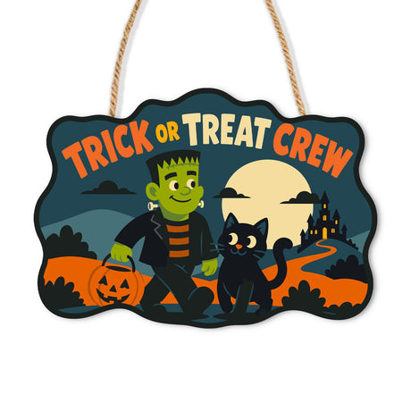 Monster and Black Cat Treat Walk paint by numbers hanging sign – Flat-headed green monster with a pumpkin pail walking beside a black cat toward a castle, lettered Trick or Treat Crew, on a wooden sign with a rope hanger