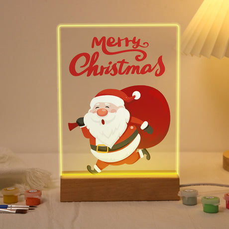 Santa Dashing with His Sack paint by numbers light-up sign – Santa running with a big red sack over his shoulder below red Merry Christmas script, lit up on its wooden base
