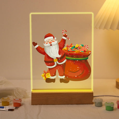 Santa with a Sack of Sweets paint by numbers light-up sign – Waving Santa holding a candy cane beside a big sack overflowing with sweets and treats, lit up on its wooden base