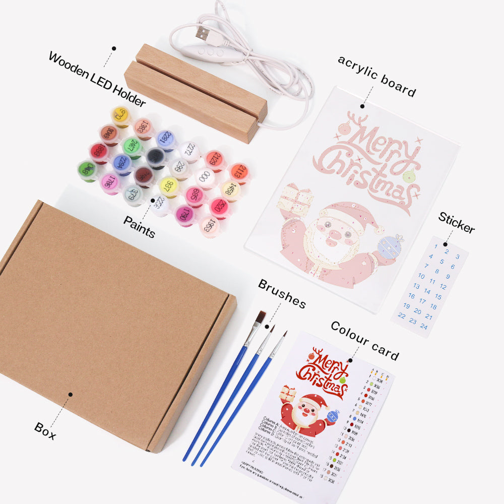 Santa Raising a Gift and Bauble paint by numbers light-up sign – what's in the kit: the acrylic sheet, wooden LED base, numbered paints and brushes