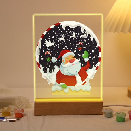 Santa Waving at the Night Sleigh paint by numbers light-up sign – Santa waving in a round candy-striped frame with a snowy night sky and a flying sleigh silhouette, lit up on its wooden base