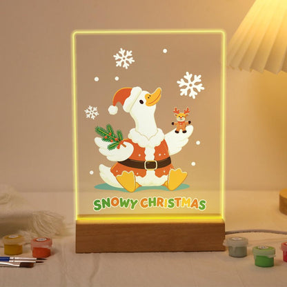Snowflake Duck with Tiny Reindeer paint by numbers light-up sign – White duck in a Santa suit holding a holly sprig and a tiny reindeer among snowflakes, Snowy Christmas lettering, lit up on its wooden base