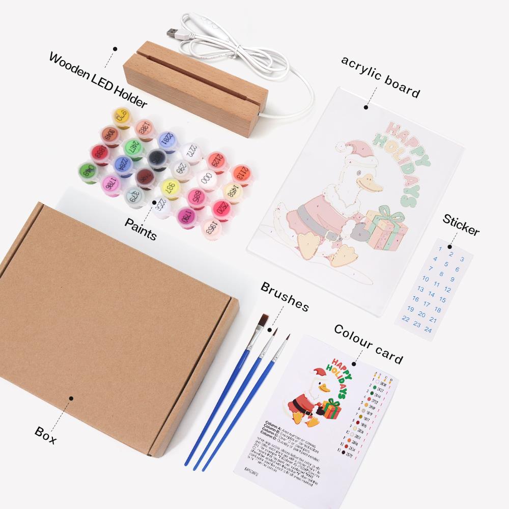 Duck Delivering a Holiday Gift paint by numbers light-up sign – what's in the kit: the acrylic sheet, wooden LED base, numbered paints and brushes