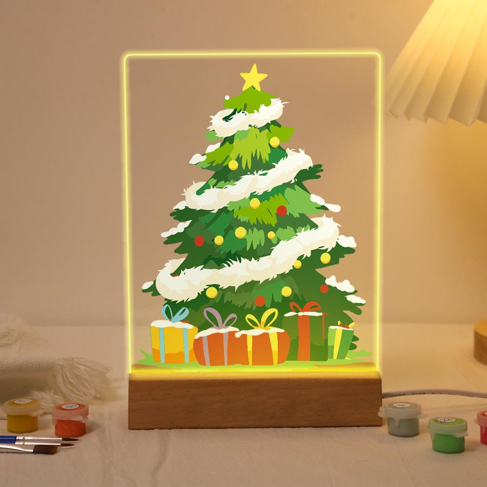 Tinsel-Wrapped Christmas Tree paint by numbers light-up sign – Green Christmas tree wrapped in white tinsel garland with a gold star, colored ornaments and gifts underneath, lit up on its wooden base