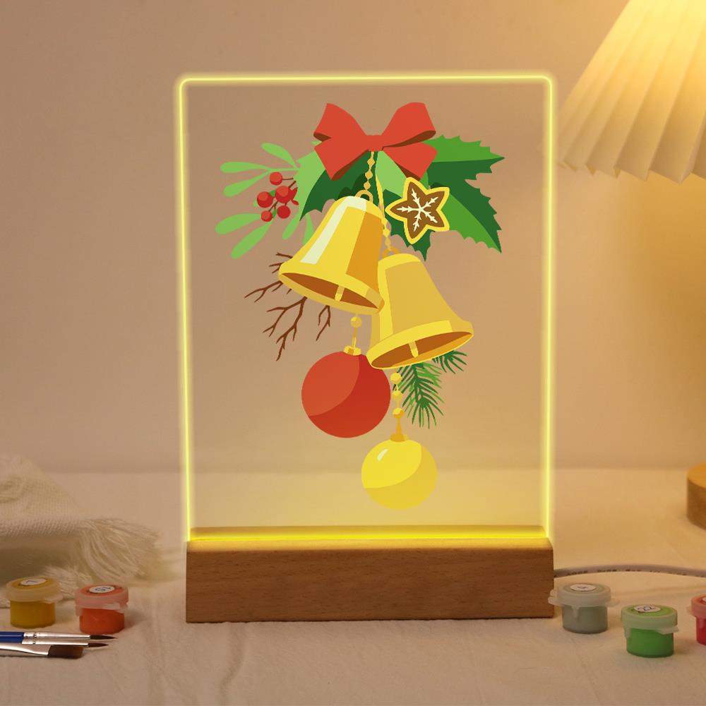 Golden Bells and Red Bow paint by numbers light-up sign – Two golden bells tied with a red bow and holly, with red and gold baubles hanging below, lit up on its wooden base