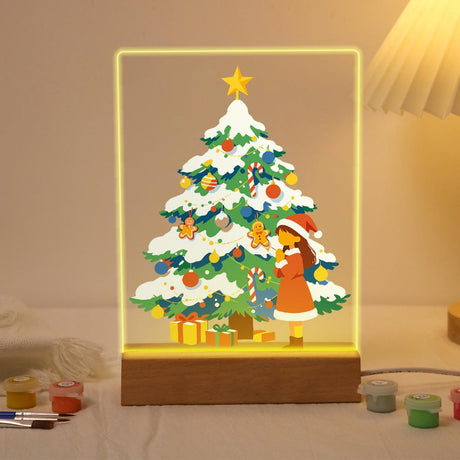 Little Girl by the Snowy Tree paint by numbers light-up sign – Snow-covered Christmas tree with candy canes and a gold star, a little girl in a red coat beside it, lit up on its wooden base