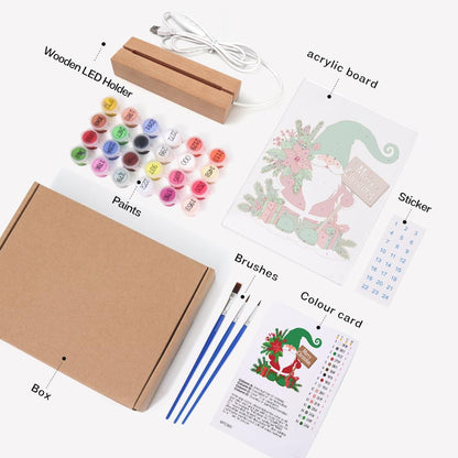 Green-Hat Gnome with Poinsettias paint by numbers light-up sign – what's in the kit: the acrylic sheet, wooden LED base, numbered paints and brushes