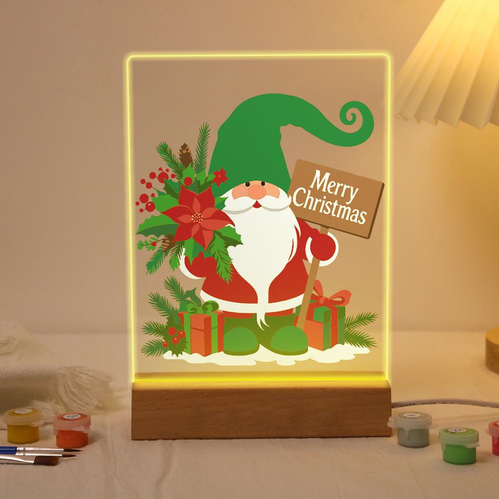Green-Hat Gnome with Poinsettias paint by numbers light-up sign – Bearded gnome in a tall green floppy hat and red suit holding a Merry Christmas plaque among poinsettias and gifts, lit up on its wooden base