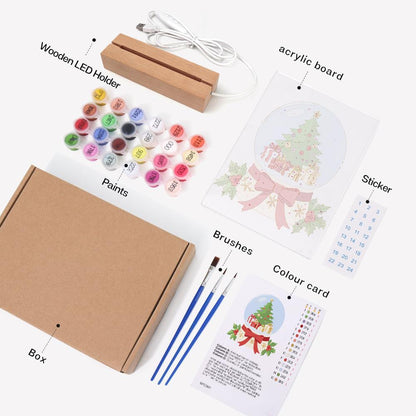 Ribbon-Tied Snow Globe Tree paint by numbers light-up sign – what's in the kit: the acrylic sheet, wooden LED base, numbered paints and brushes