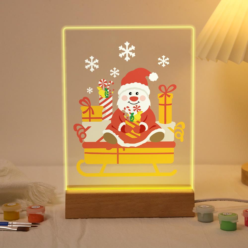 Santa's Candy-Cane Sleigh paint by numbers light-up sign – Round-faced Santa sitting in a golden sleigh piled with gifts and candy canes under falling snowflakes, lit up on its wooden base