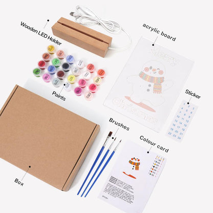 Strolling Snowman in a Knit Scarf paint by numbers light-up sign – what's in the kit: the acrylic sheet, wooden LED base, numbered paints and brushes