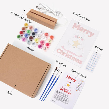 Snowman Hugging a Gold Star paint by numbers light-up sign – what's in the kit: the acrylic sheet, wooden LED base, numbered paints and brushes