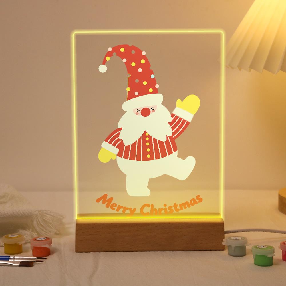 Waving Santa on One Leg paint by numbers light-up sign – Santa in a polka-dot hat and striped suit waving a yellow mitten and kicking one leg back, lit up on its wooden base
