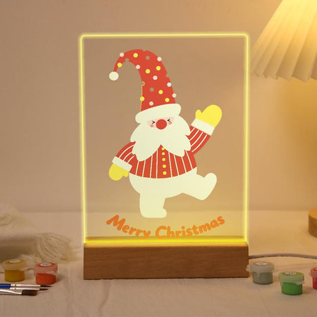 Waving Santa on One Leg paint by numbers light-up sign – Santa in a polka-dot hat and striped suit waving a yellow mitten and kicking one leg back, lit up on its wooden base