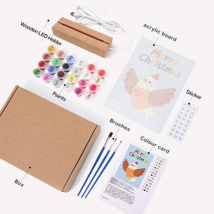 Eagle Spreading Festive Wings paint by numbers light-up sign – what's in the kit: the acrylic sheet, wooden LED base, numbered paints and brushes