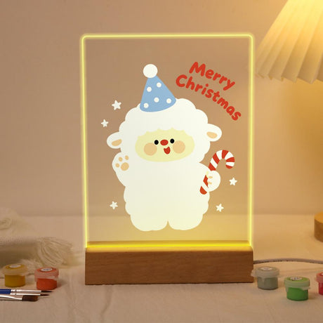 Waving Lamb with a Candy Cane paint by numbers light-up sign – Fluffy white sheep in a blue polka-dot party hat waving and holding a candy cane among stars, lit up on its wooden base
