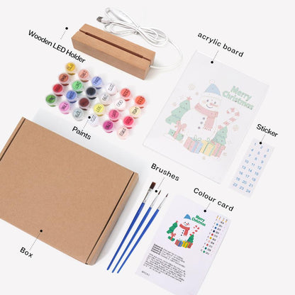 Snowman with a Candy Cane Staff paint by numbers light-up sign – what's in the kit: the acrylic sheet, wooden LED base, numbered paints and brushes