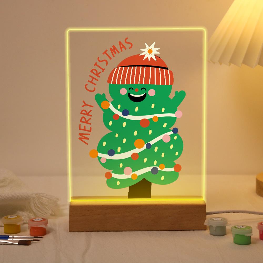 Grinning Tree in a Knit Beanie paint by numbers light-up sign – Smiling Christmas tree in a striped knit beanie wrapped in lights and garland, branches raised, lit up on its wooden base