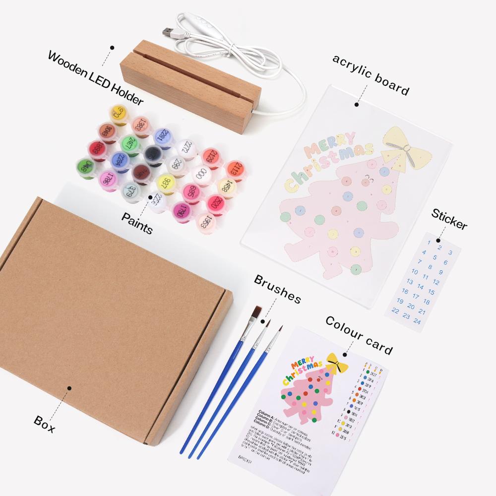Happy-Faced Pink Christmas Tree paint by numbers light-up sign – what's in the kit: the acrylic sheet, wooden LED base, numbered paints and brushes