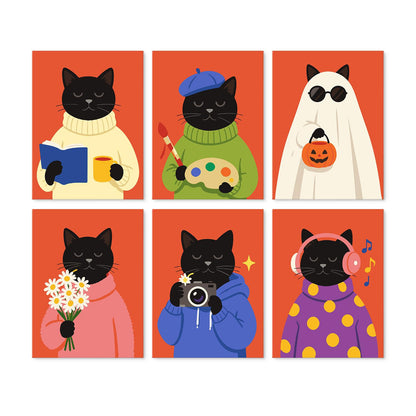 Black Cats in Cozy Sweaters mini board kit – Black cats on orange reading, painting, in a ghost sheet, holding daisies, taking photos and wearing headphones