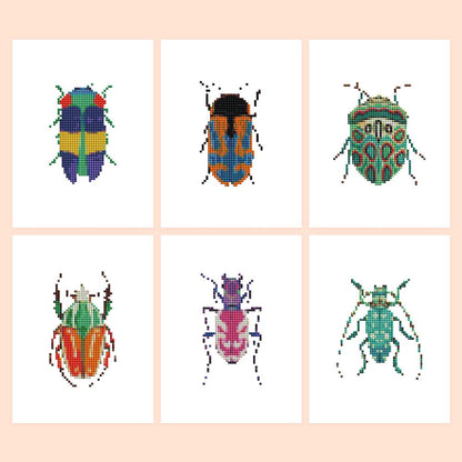 Jewel Beetle Specimens mini diamond painting – Six brightly patterned beetles in blue, orange, teal and red, shown from above like museum specimens
