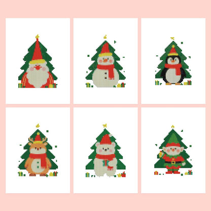 Christmas Tree Peekaboo Pals mini diamond painting – Six Christmas trees, each framing a cute character: gnome, snowman, penguin, fox, polar bear and elf