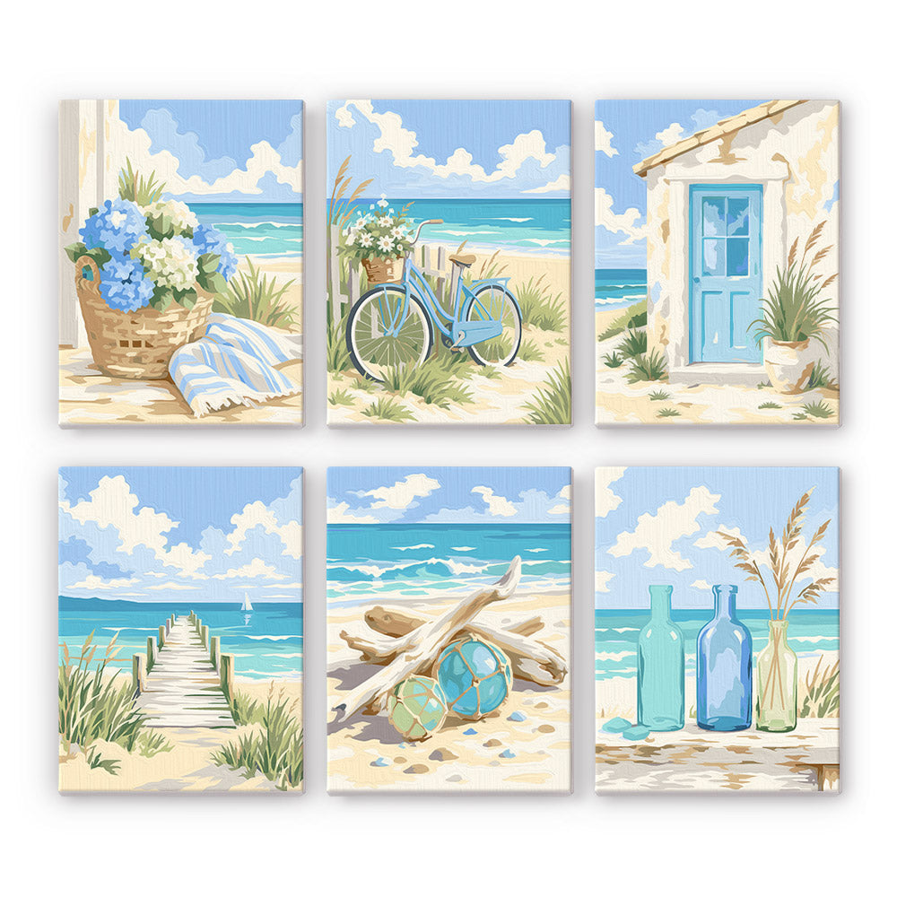 Blue Bottles and Driftwood Dunes mini paint by numbers – Airy coastal still lifes: hydrangea basket, bicycle in the dunes, blue door, pier, driftwood, glass bottles