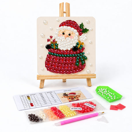 Santa Peeking Over a Red Sack pearl painting easel kit – Santa peeking over a large round red sack tied with greenery, with wrapped gifts and a candy cane