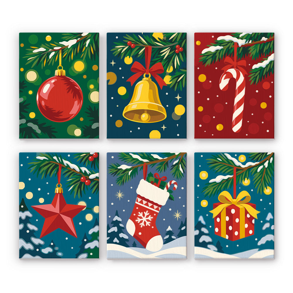 Pine Bough Baubles at Night mini paint by numbers – Red bauble, gold bell, candy cane, red star, stocking and gift hanging from snowy pine branches on dark colors